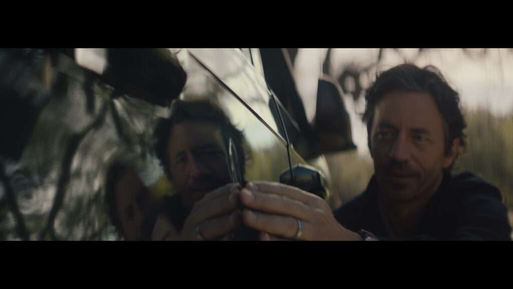 Jeep ad 2023: Reflection in mirror captures a man's sentimental journey.