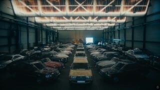 A grand warehouse showcasing an array of parked Mercedes-Benz cars, defining class and luxury.