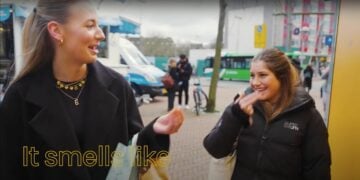 Two women having a conversation outdoors with overlay text that reads "it smells like McDonald's.